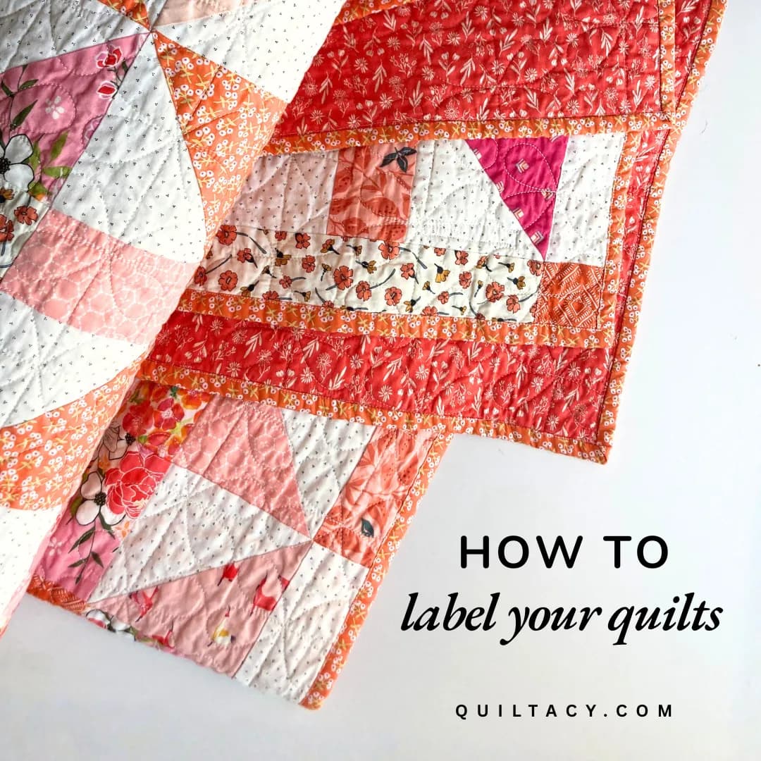 A pink and red patchwork quilt